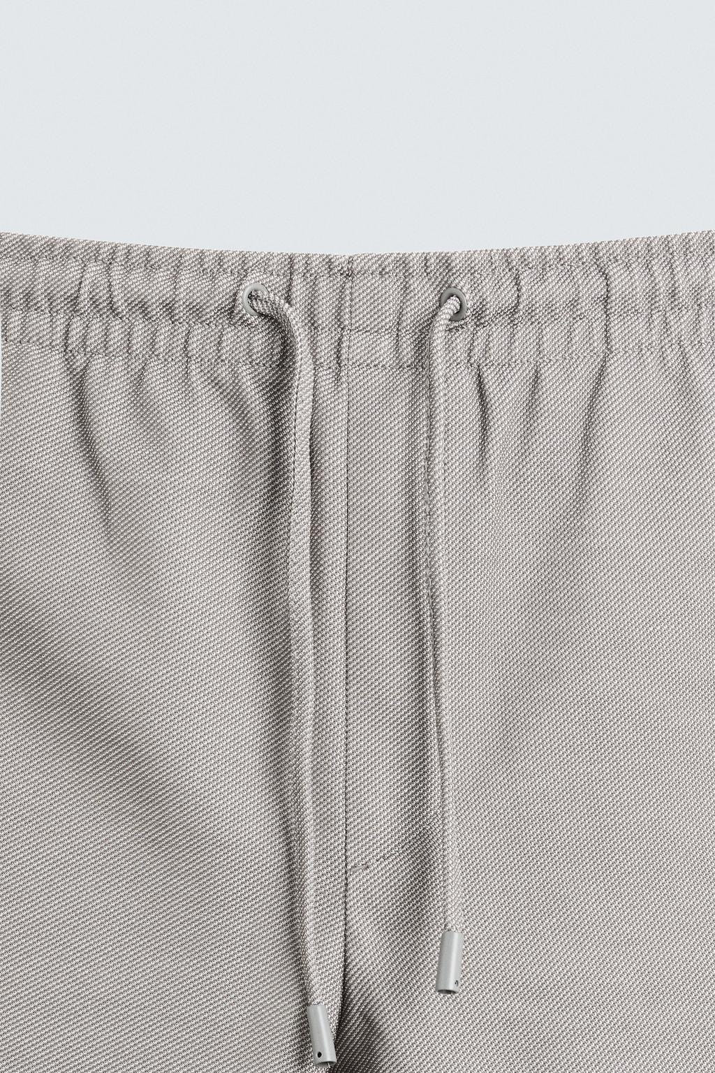 Structured Knit Travel Trousers in Light Grey