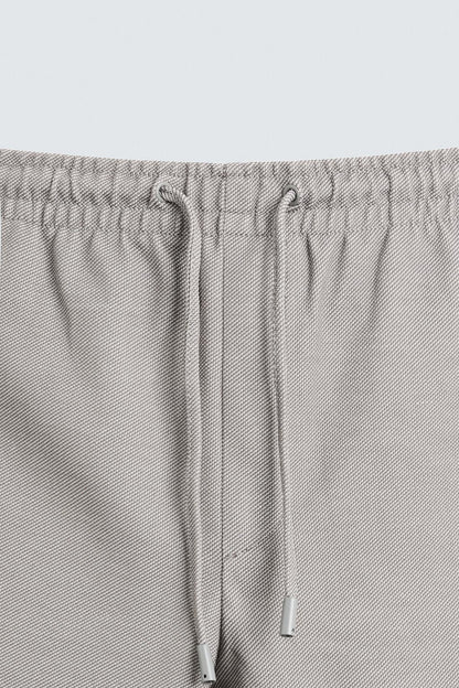 Structured Knit Travel Trousers in Light Grey