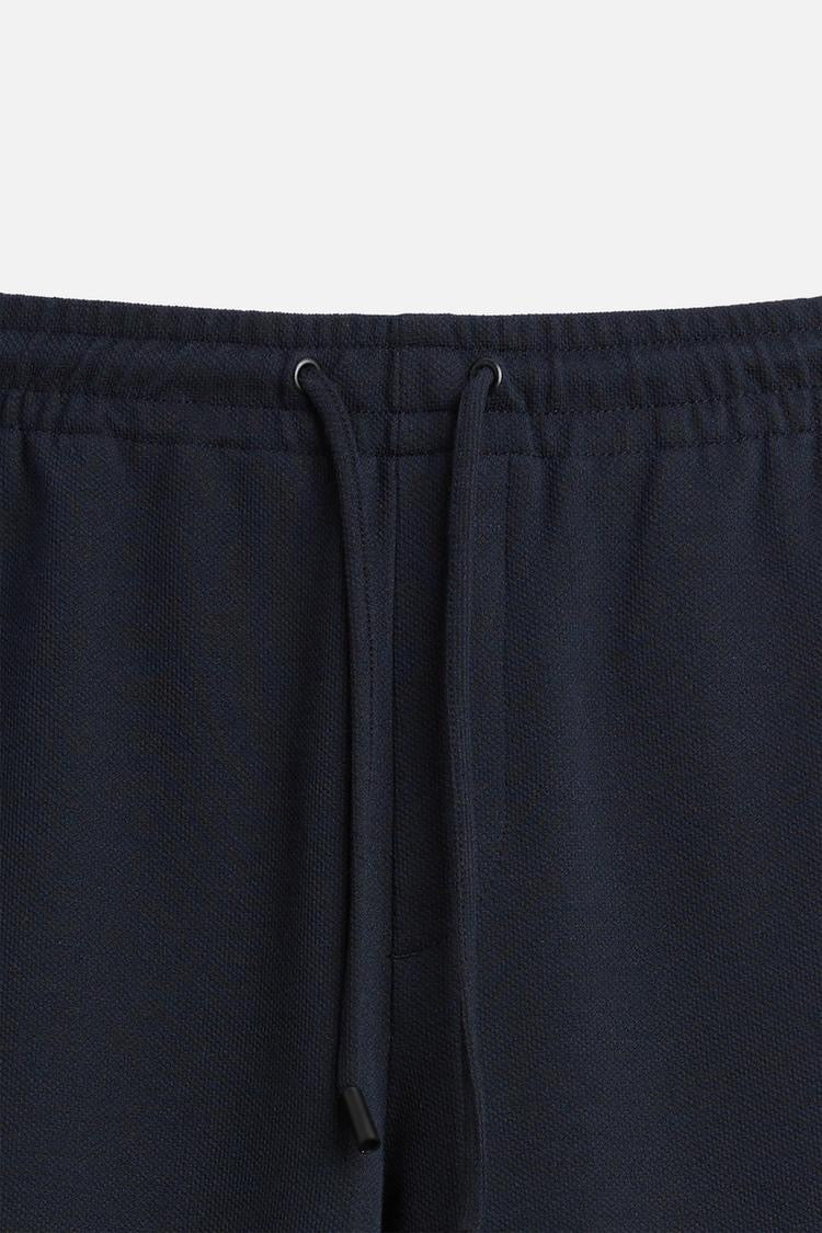 Structured Knit Travel Trousers in Navy